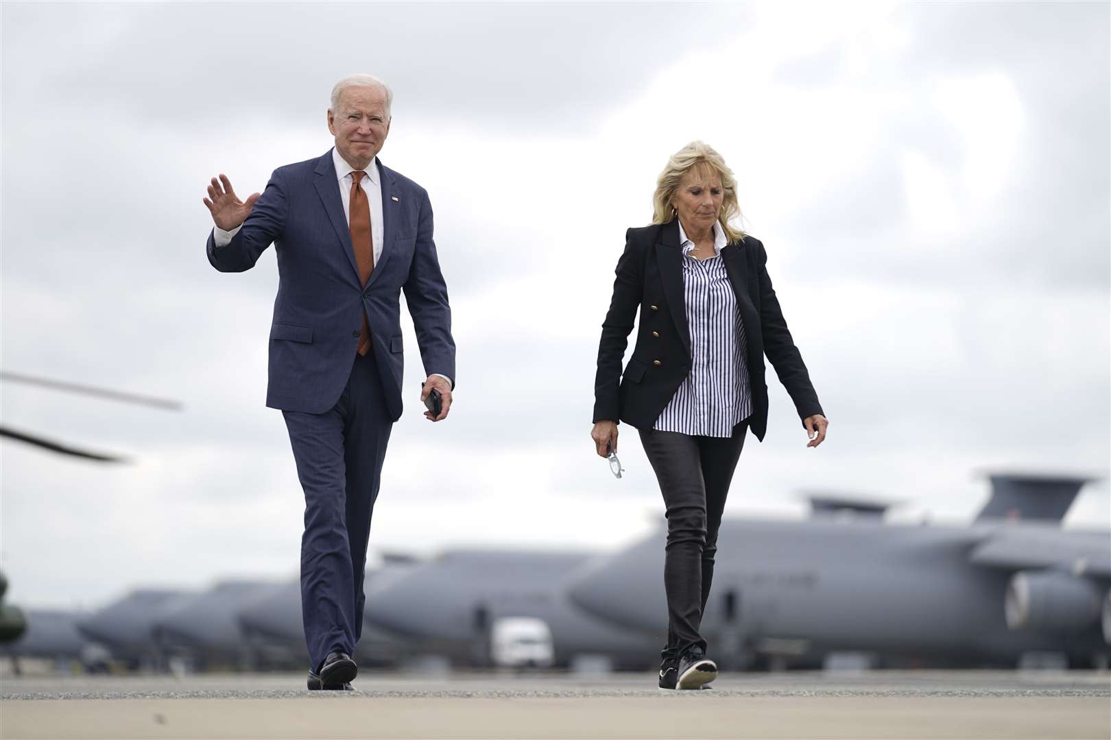 President Joe Biden and first lady Jill Biden arrive to board Air Force One (Andrew Harnik/AP)