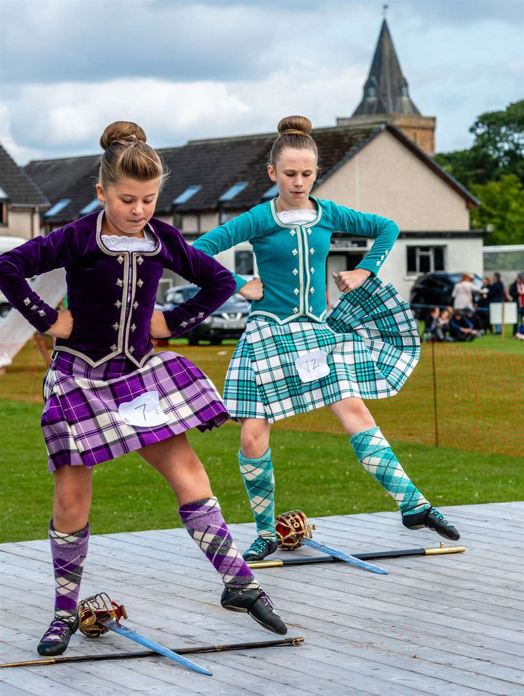 Gracie Schofield and Eilidh Guthrie compete in the 12 years and under sword dance. Picture:Andy Kirby