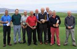 Nairn’s Pat Tomisson (centre) with the Macallan Trophy and other prizewinners and officials.