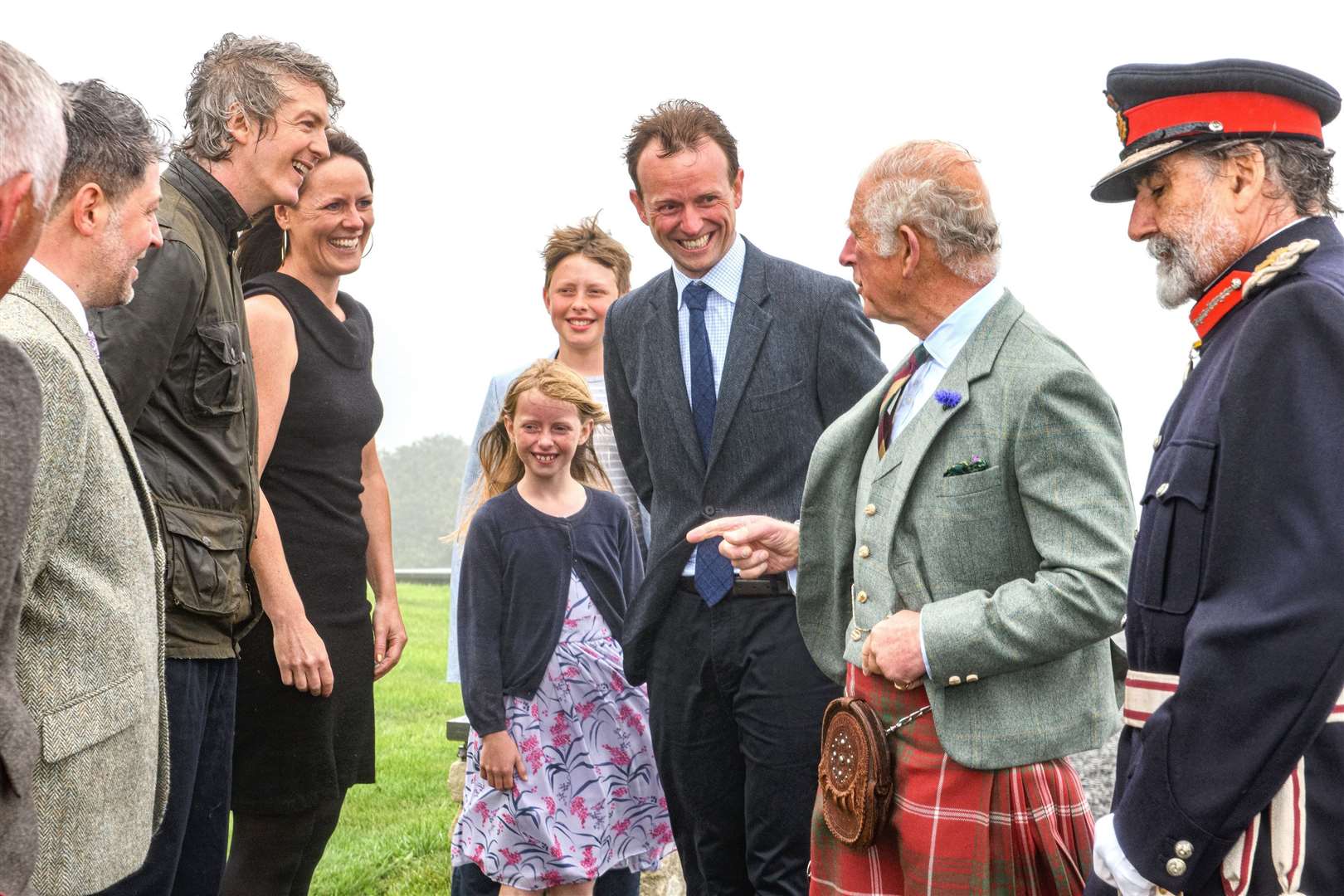A light-hearted moment during the royal tour last Thursday. From left, Iain Levens at edge of picture, Adrian Ionescu, Ed Nassau Lake, Chloë Dunnett, Phoebe and Oliver Dunnett with their father George, HRH Prince Charles and Lord Thurso. Picture: Angus Mackay
