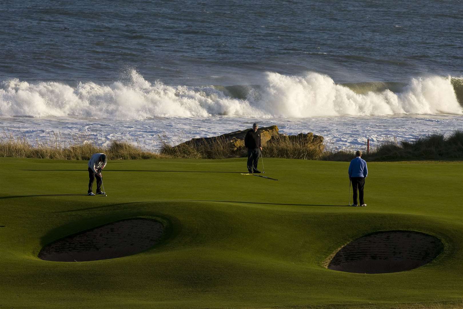 The classic links land 'will offer you nothing but wild magnificent seas, skies, and mountains'.