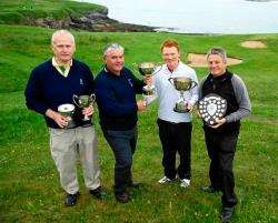 Pictured, receiving his spoils from Club Captain John Mackenzie is John McCook, Abernethy GC, who helped get Durness Golf Week off to a flier with a Course Record equalling 68 which won him both Scratch and Handicap trophies in the Mens Open.