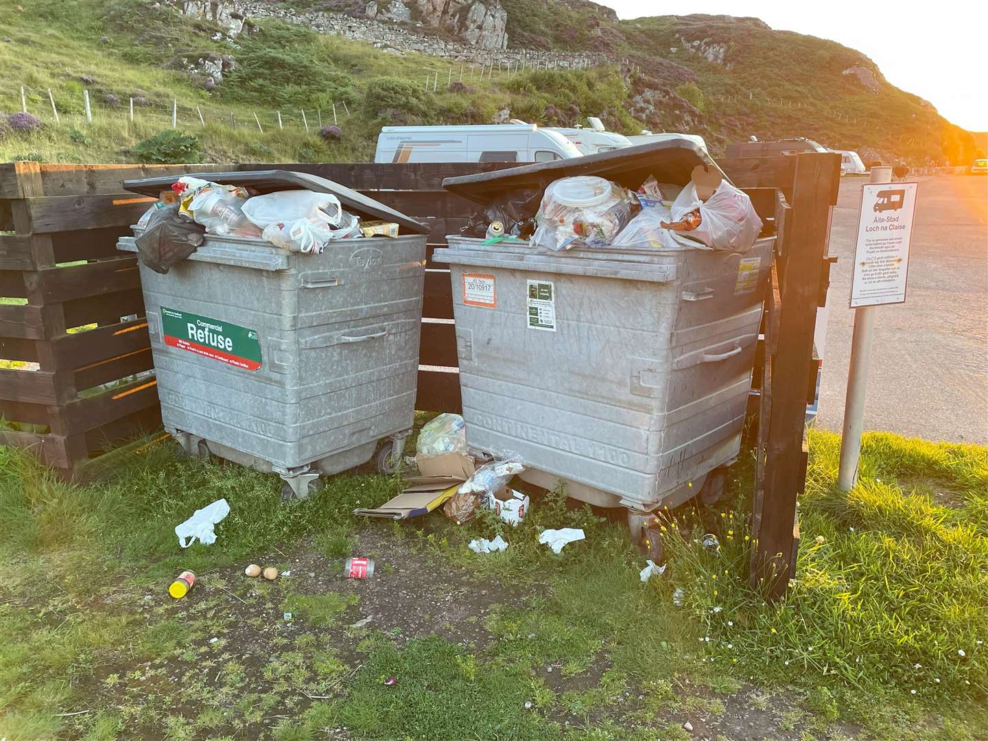 Overflowing wastebins on the NC500 at Loch Clash motorhome stopover, Kinlochbervie.
