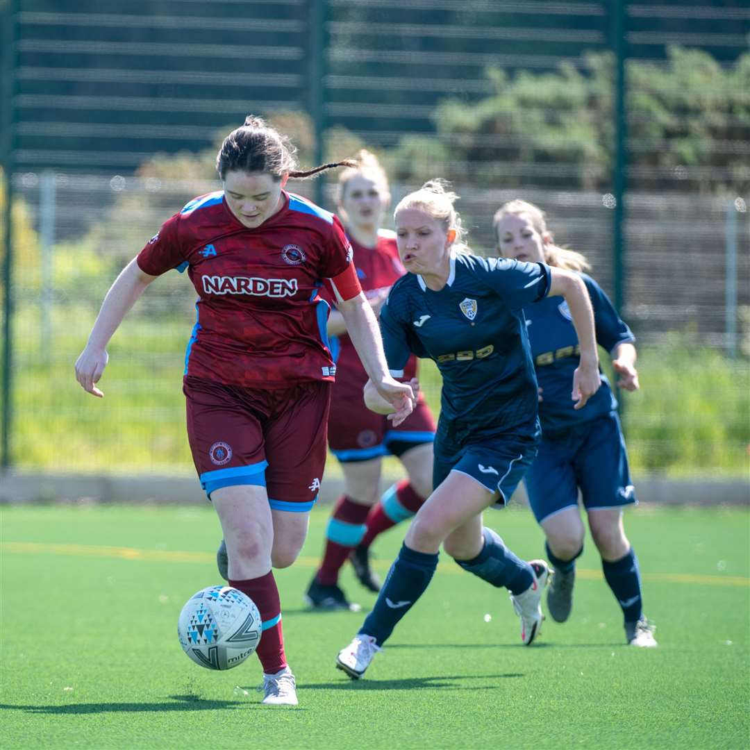 Nairn's Rebecca Horgan comes away with the ball. Picture: Callum Mackay.