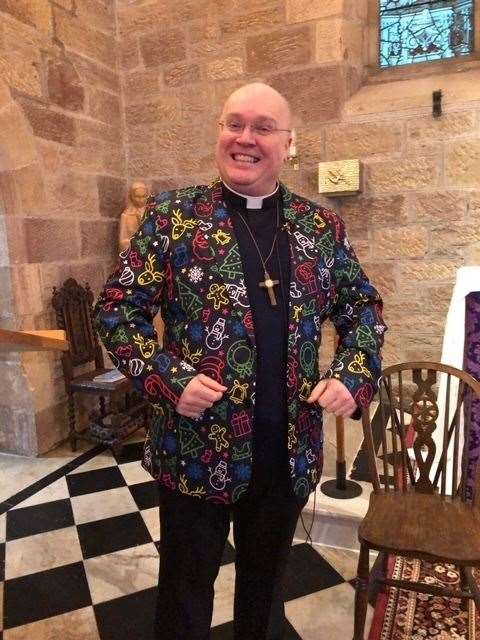 Father Simon Scott looked particularly festive for the Christingle service at St Finnbarr's Scottish Episcopal Church, Dornoch.