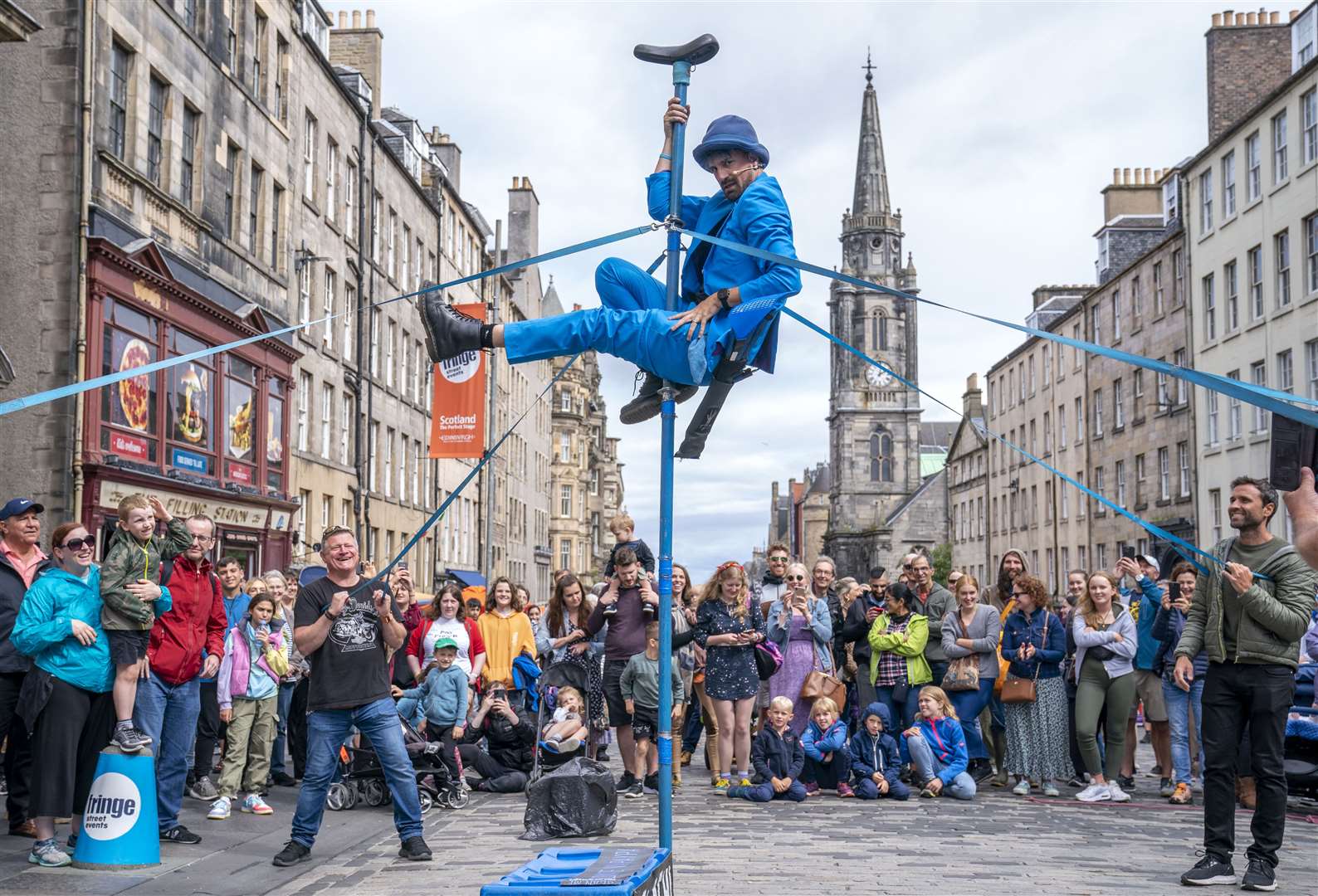 Street performer Malachi Frost entertains the crowds on the Royal Mile during Edinburgh Festival Fringe in 2023 (Jane Barlow/PA Wire)