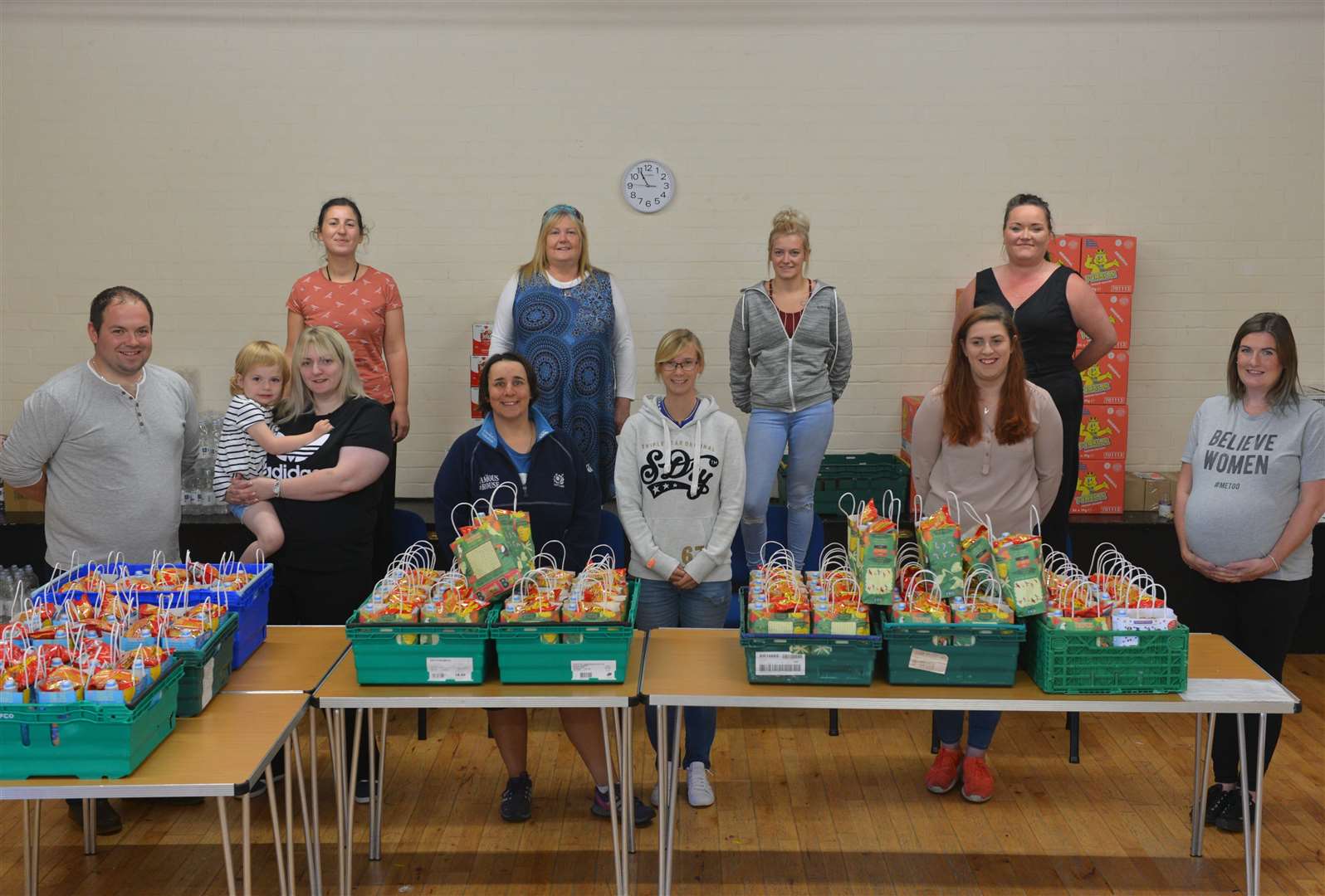 The volunteers who assembled lunch bags and delivered them twice weekly to 90 households for 10 weeks. Pictured are: Eilidh and Alan Macleod with daughter Leah, Konstantina Pateraki, Kim Jappy, Fiona Macfarlane, Nicola Jappy, Lara Ryan, Tiegan Johnstone, Karen Gilmour, and Joanna Mackenzie. Picture: Jim A Johnston