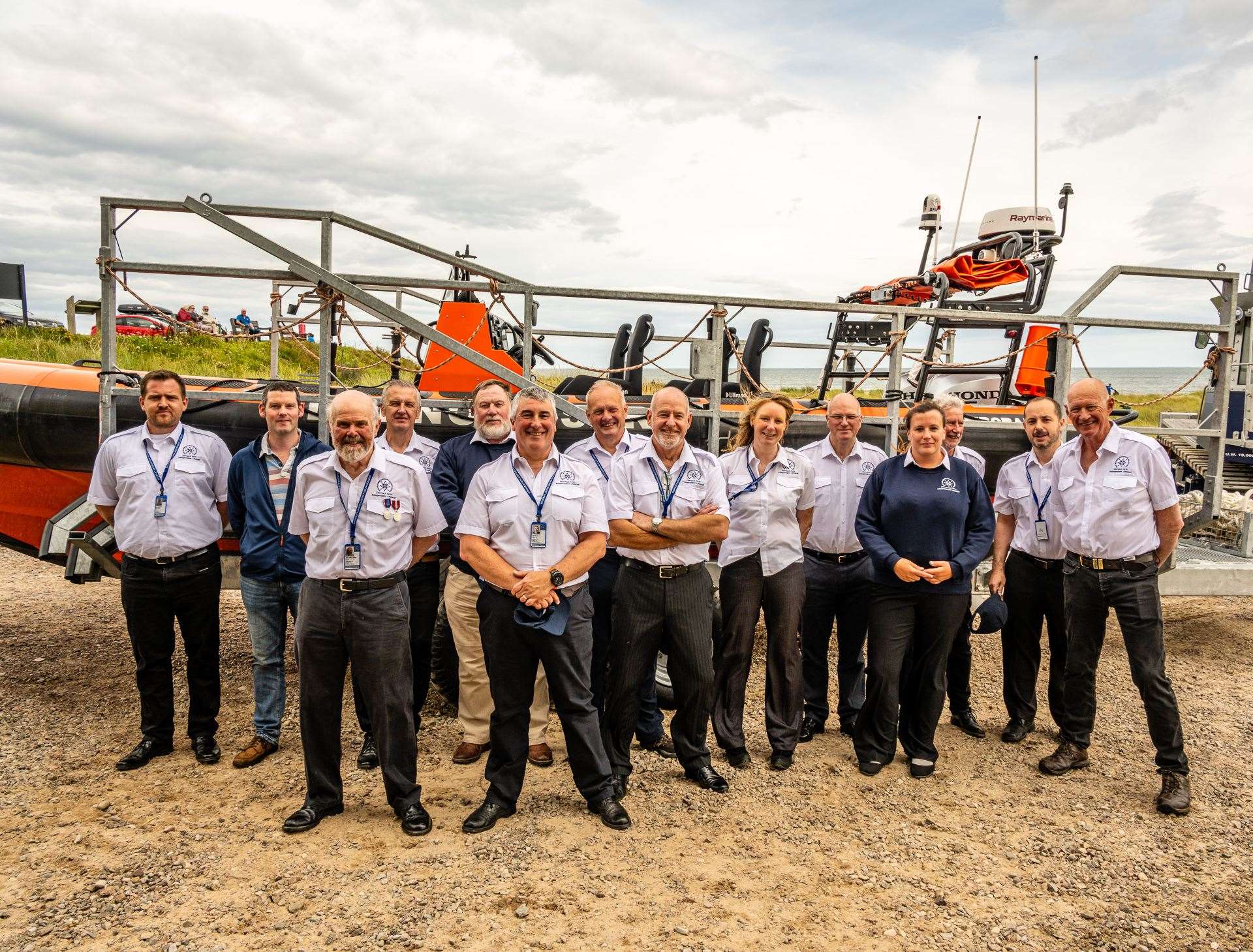 Members of East Sutherland Rescue Association next to their new boat 'Wildland'. Picture: Andy Kirby