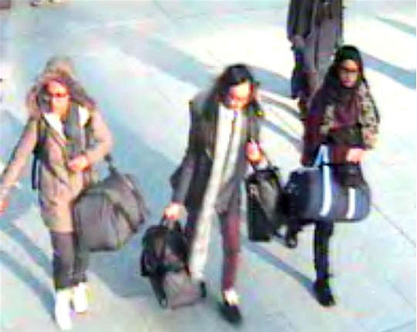 Shamima Begum, then 15, right, at Gatwick Airport on her way to Syria in February 2015 (Metropolitan Police/PA)