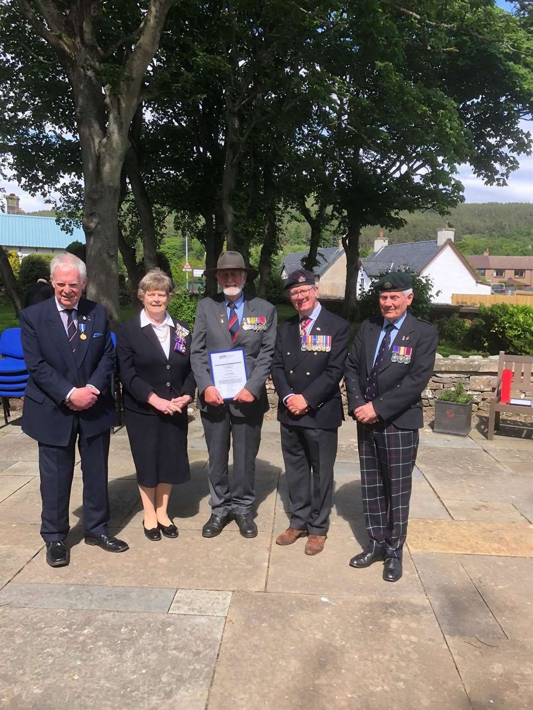 Jonathan Brett Young (centre) with, from left, William Sutherland, Dr Monica Main, Major General Patrick Marriott and Alisdair Miller.