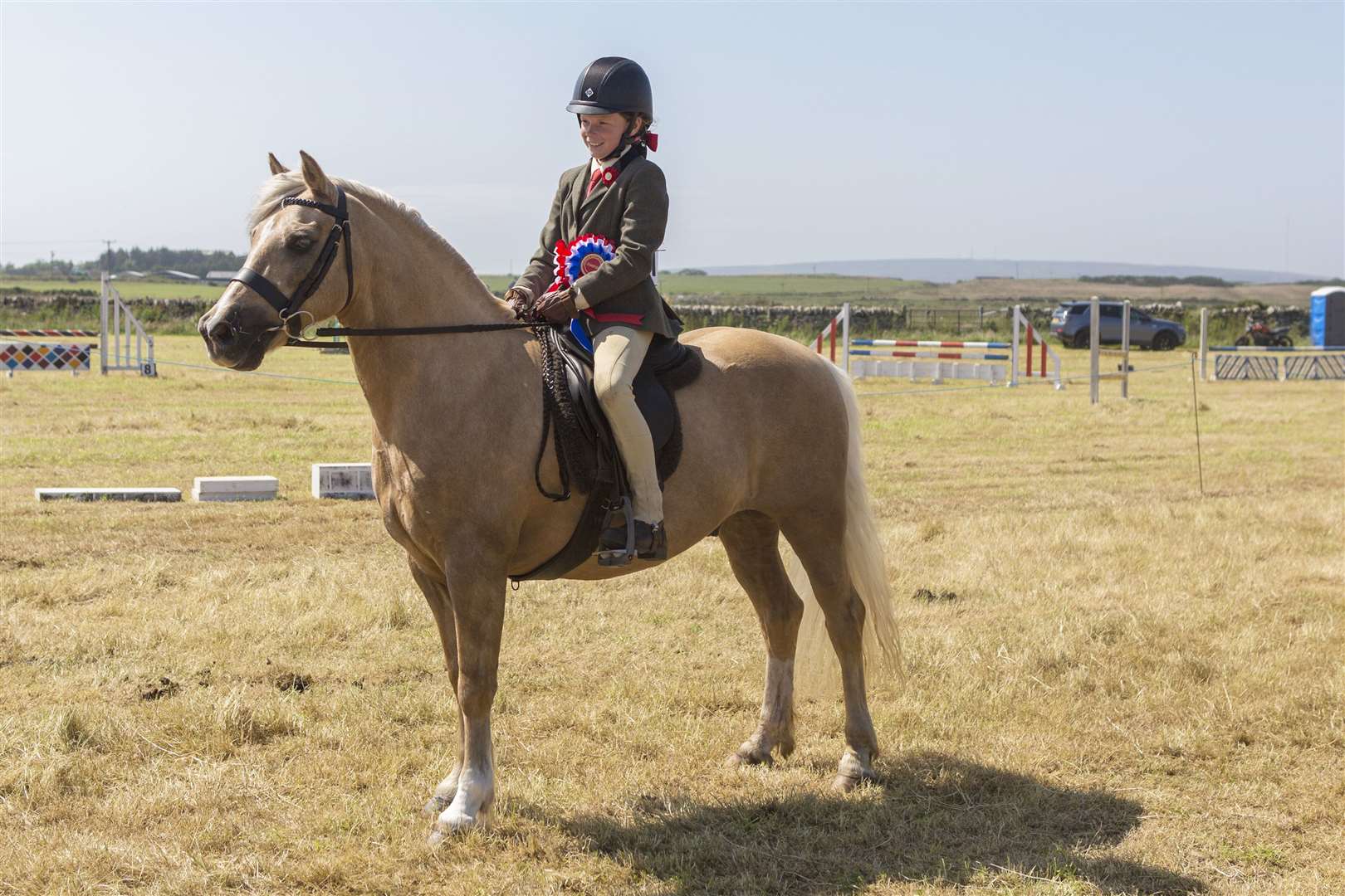 Kloe Smith, Upper Thrumster Farm, took the working hunter pony championship with Edwyn's Royal Rocket. Picture: Robert MacDonald / Northern Studios