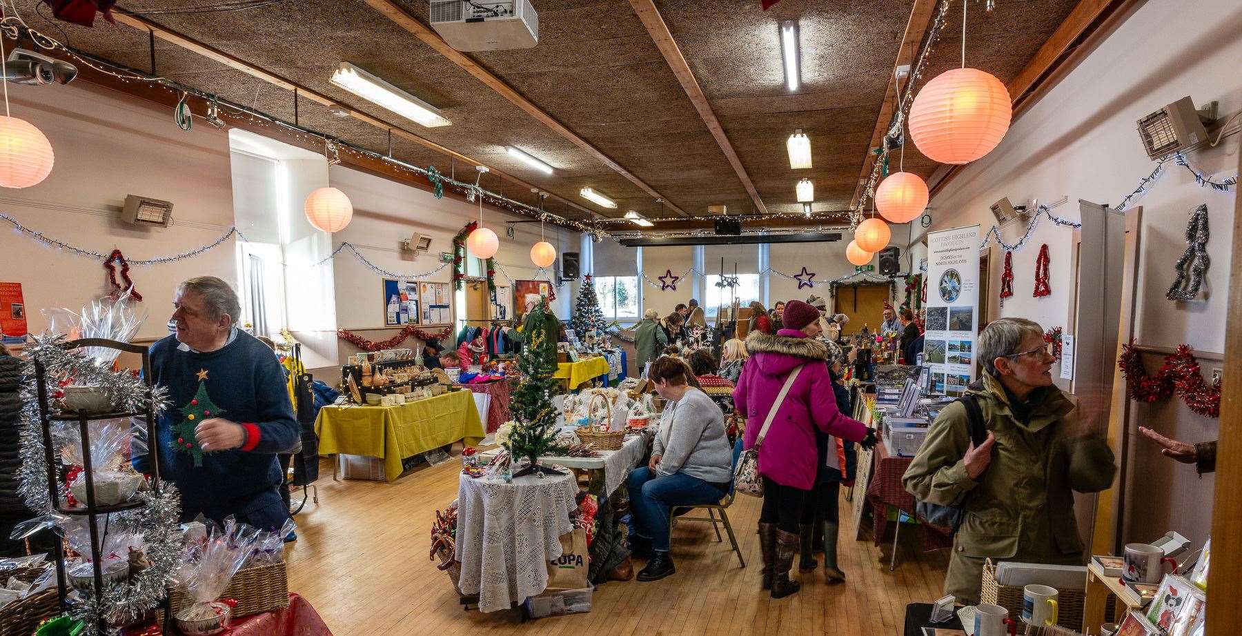 Managers of Dornoch Social Club made sure it was looking its festive best for the indoor market, with a Christmas tree, tinsel and starts. Picture: Andy Kirby