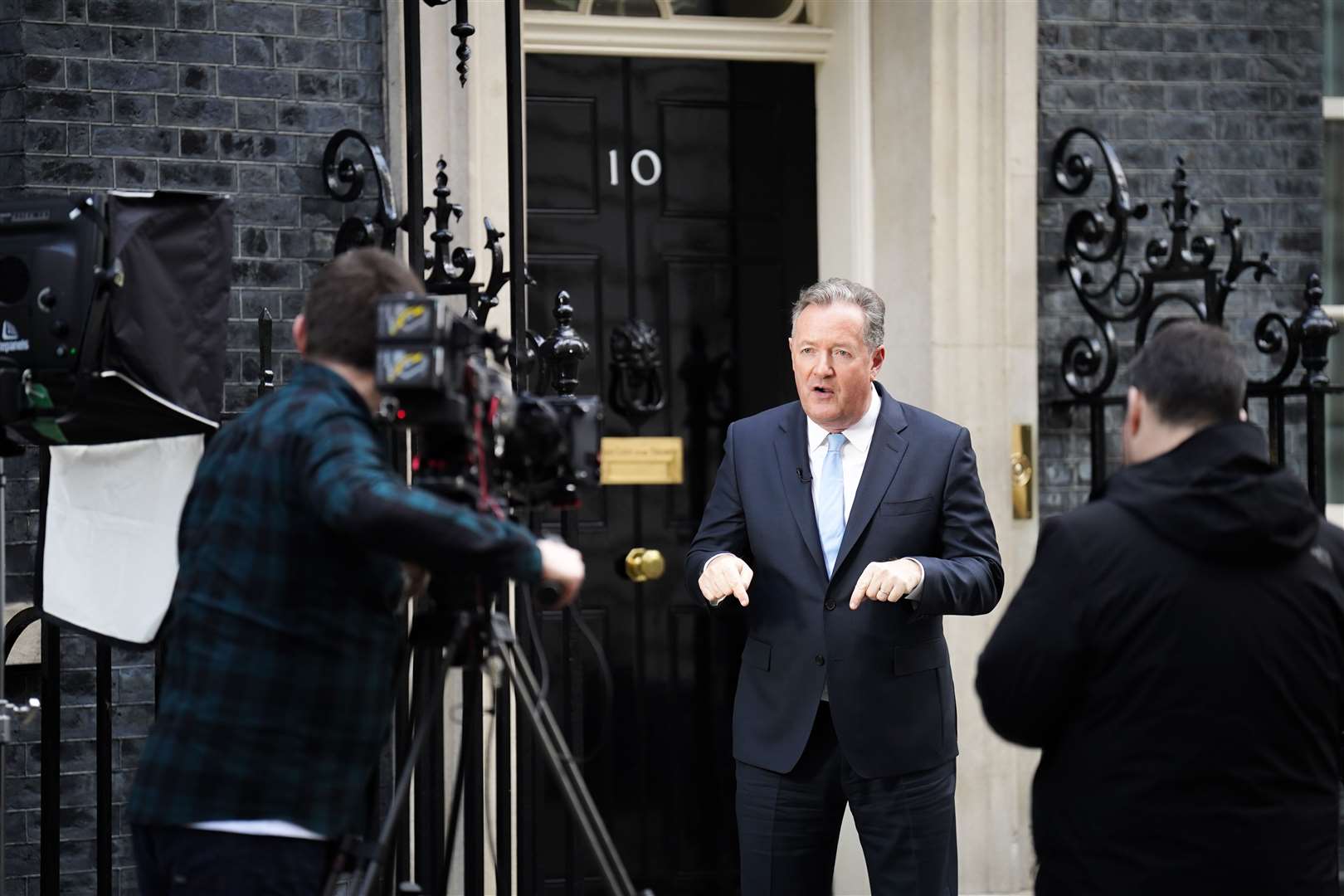 Piers Morgan filming in front of the door to 10 Downing Street (James MAnning/PA)