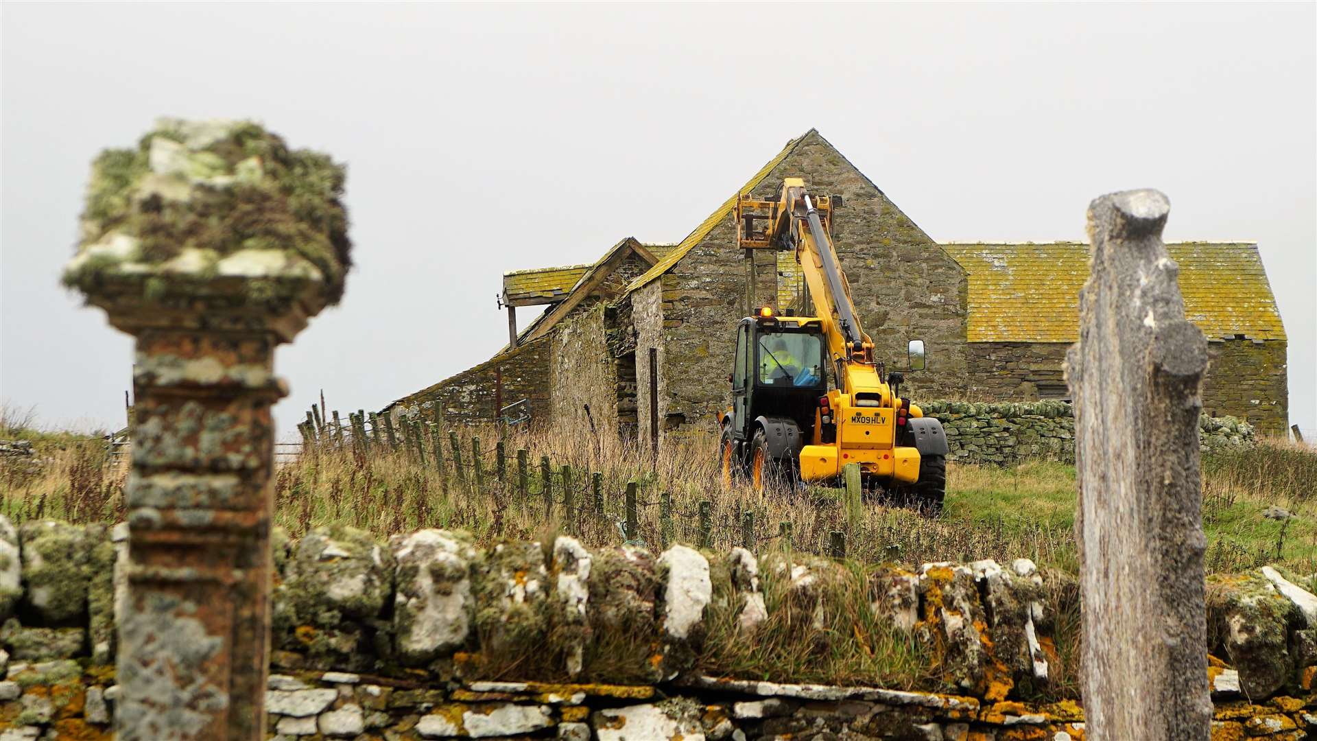 David Dunnett drives the JCB away from the site. Picture: DGS