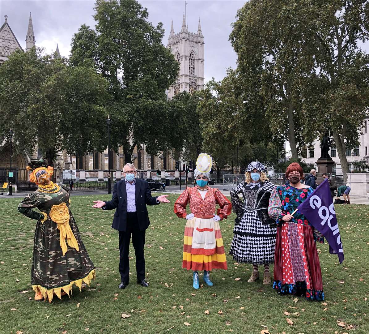 North MP Jamie Stone with some of the protesting panto dames in Parliament Square.