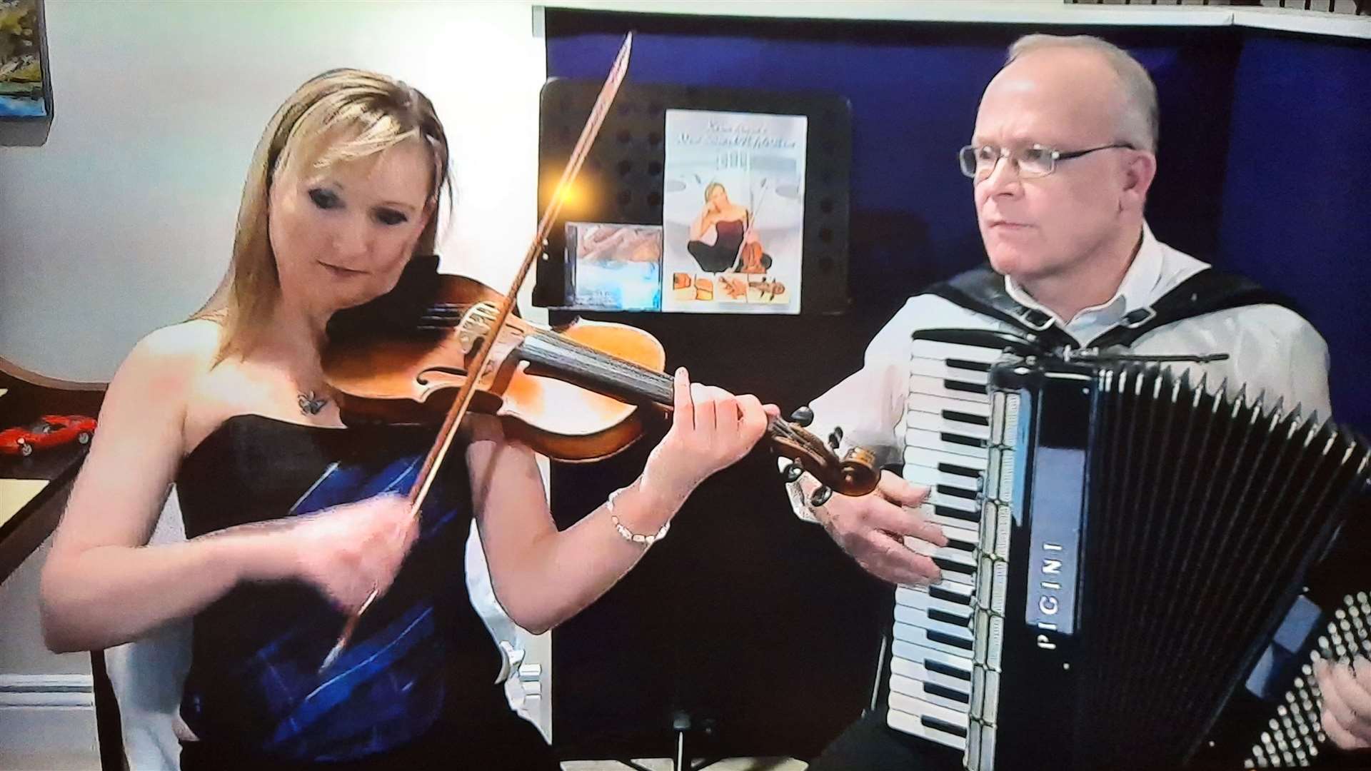 Karen Steven and Alastair MacDonald performing the show from Canada.