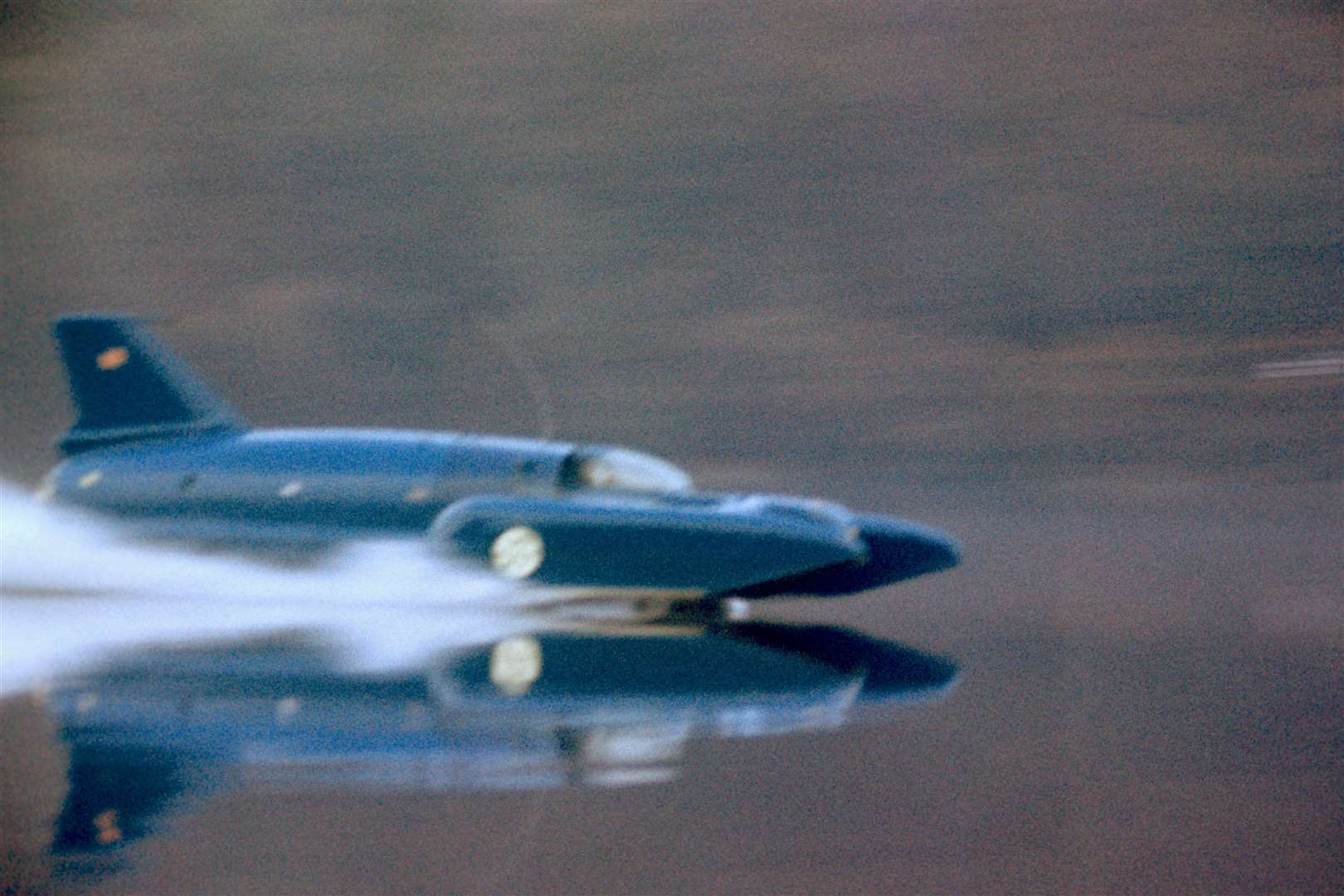 Donald Campbell’s Bluebird at speed on Coniston Water (PA)
