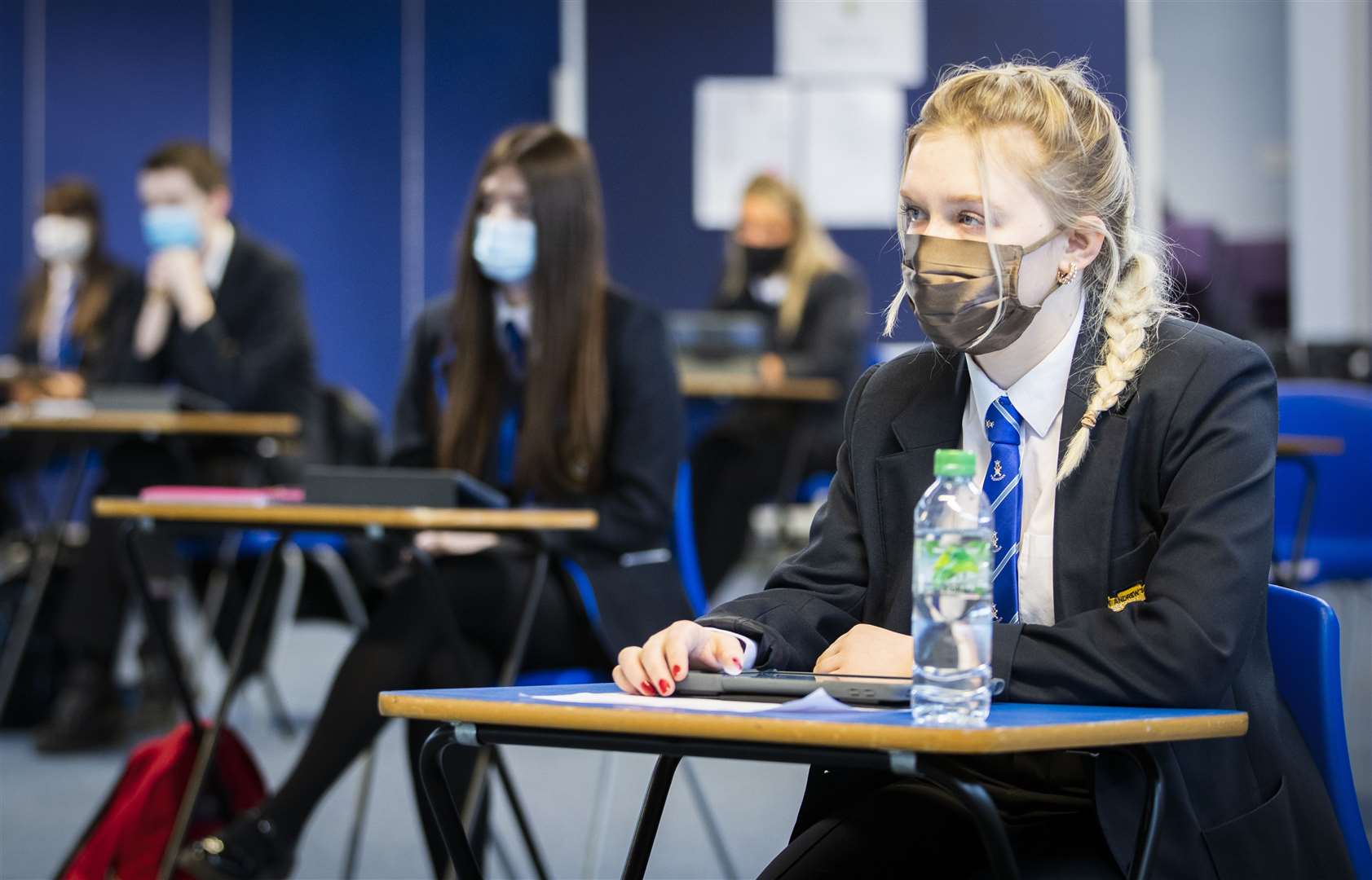 Face masks will be retained in schools (Jane Barlow/PA)