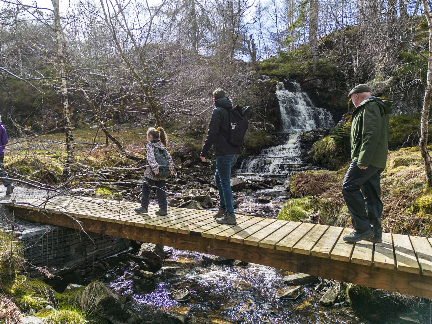 A family enjoying the trail. Ruaridh Mackay, Aidan Bell and Martin Hughes at the bridge. Picture: Peter Devlin
