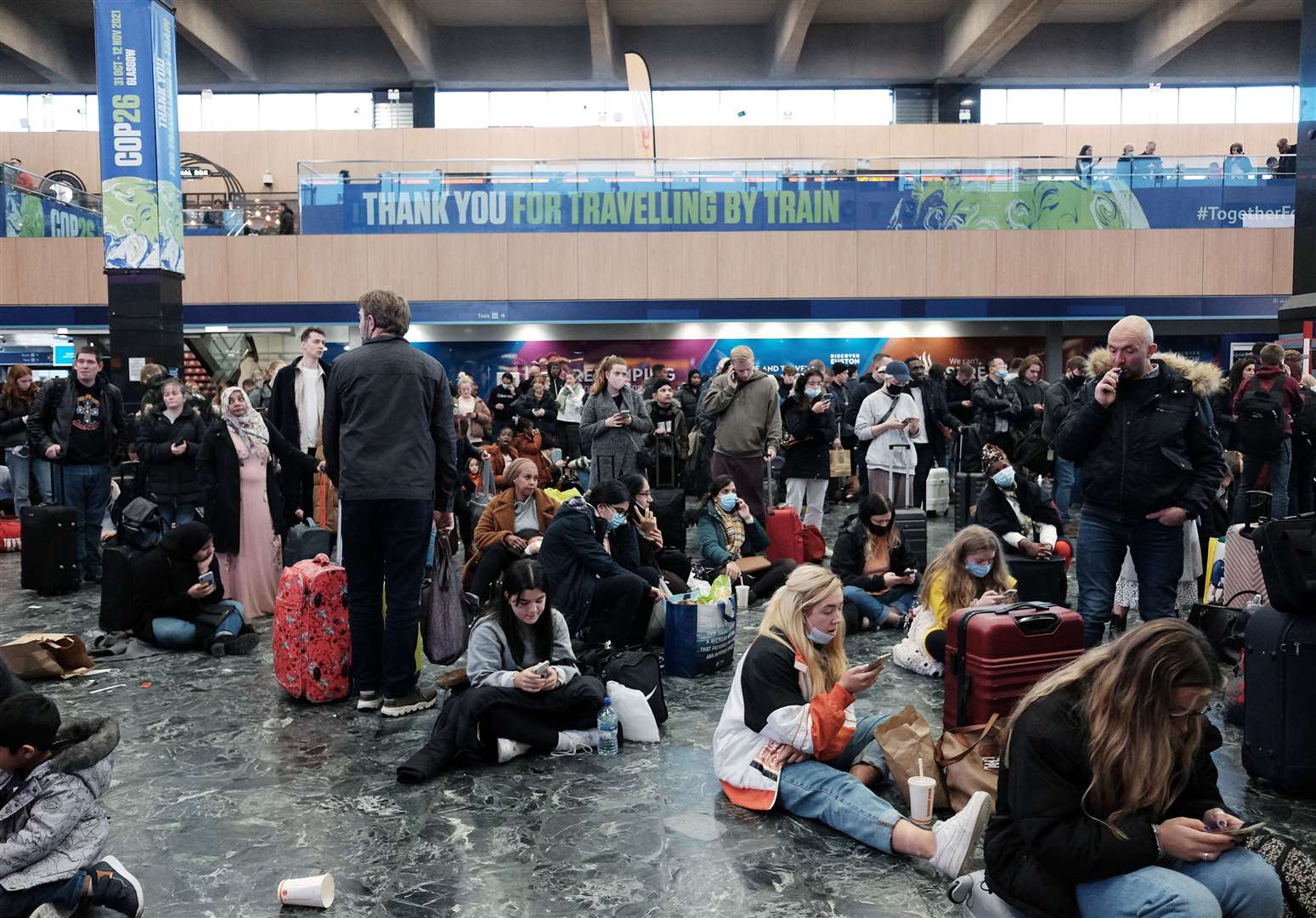 Passengers at Euston station in London (Yui Mok/PA)