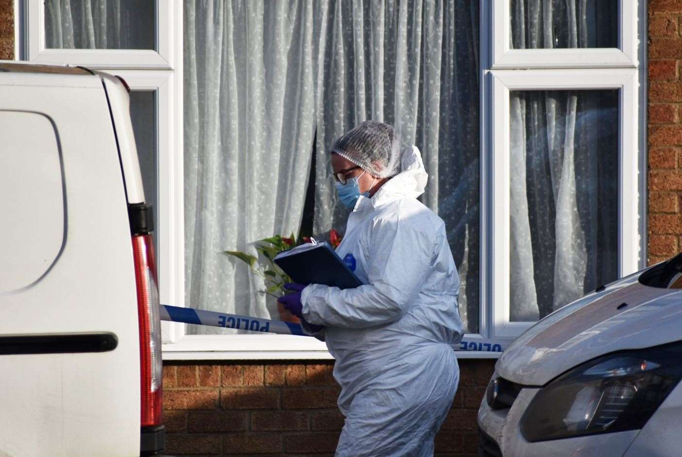 A forensic officer at the scene in Kettering last December (Matthew Cooper/PA)