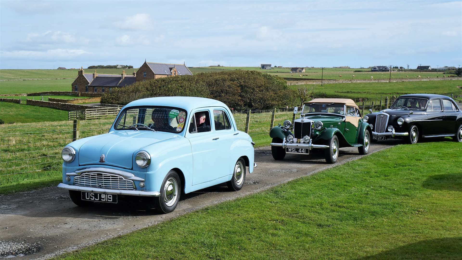 Bluebell heads the convoy of classics as they head away from the Castle of Mey. Picture: DGS