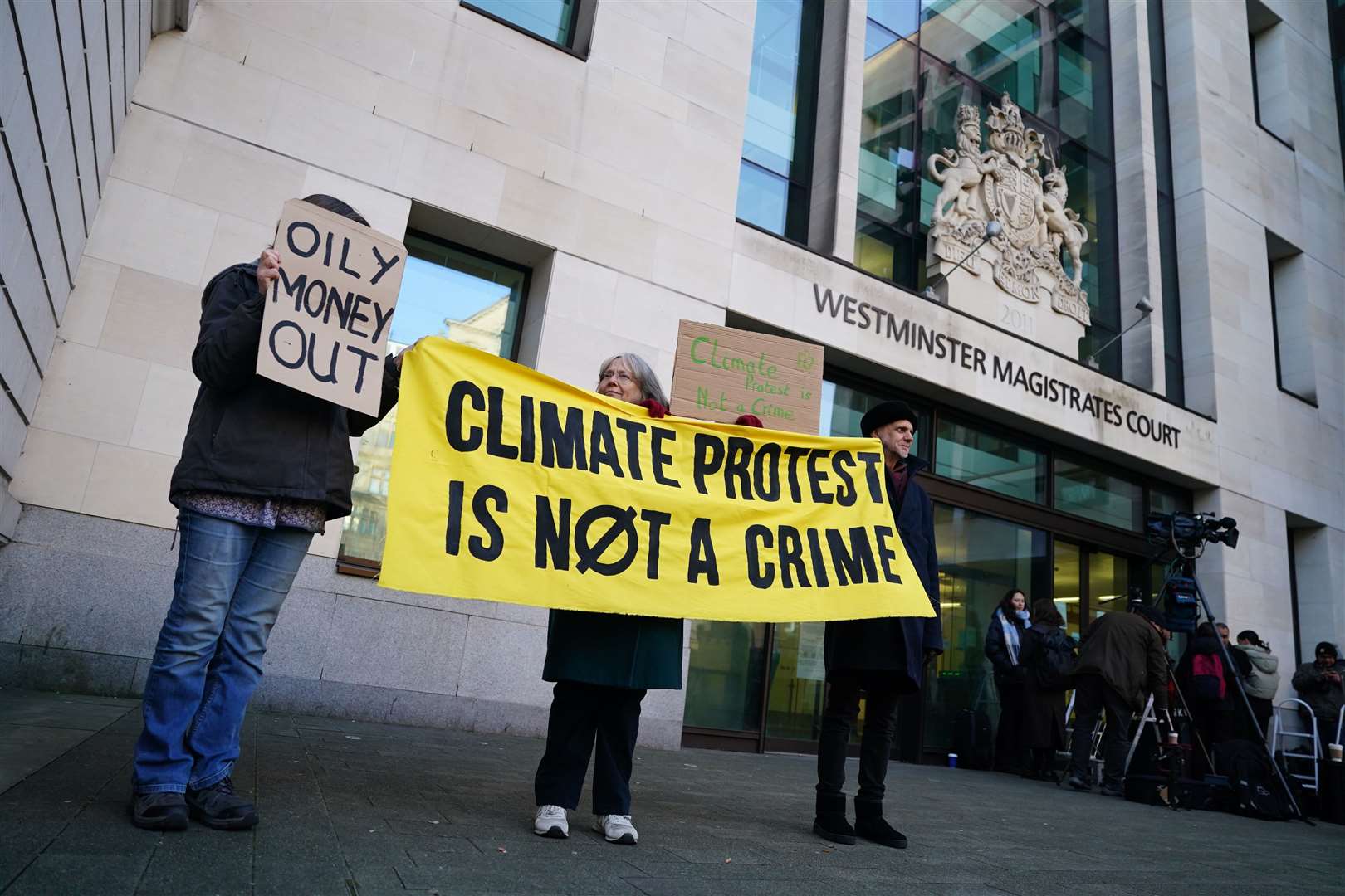 Protesters outside Westminster Magistrates’ Court (Jordan Pettitt/PA)