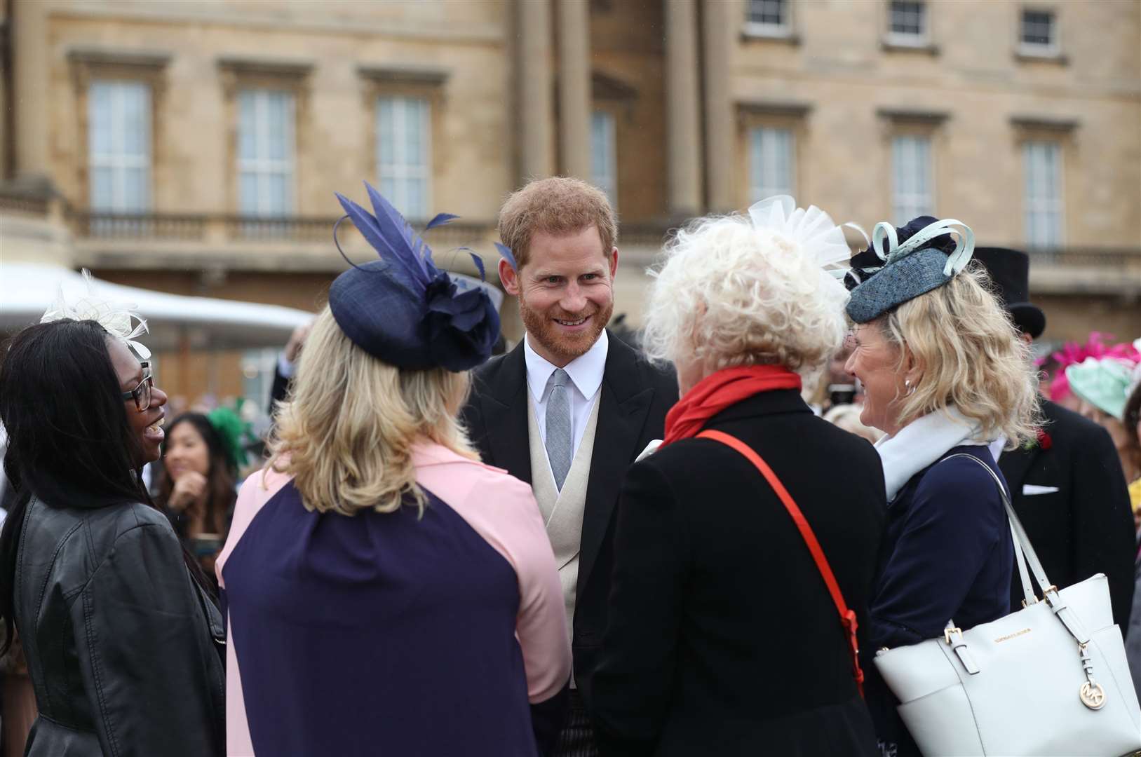 The Duke of Sussex in conversation with guests during a royal garden party (Yui Mok/PA)