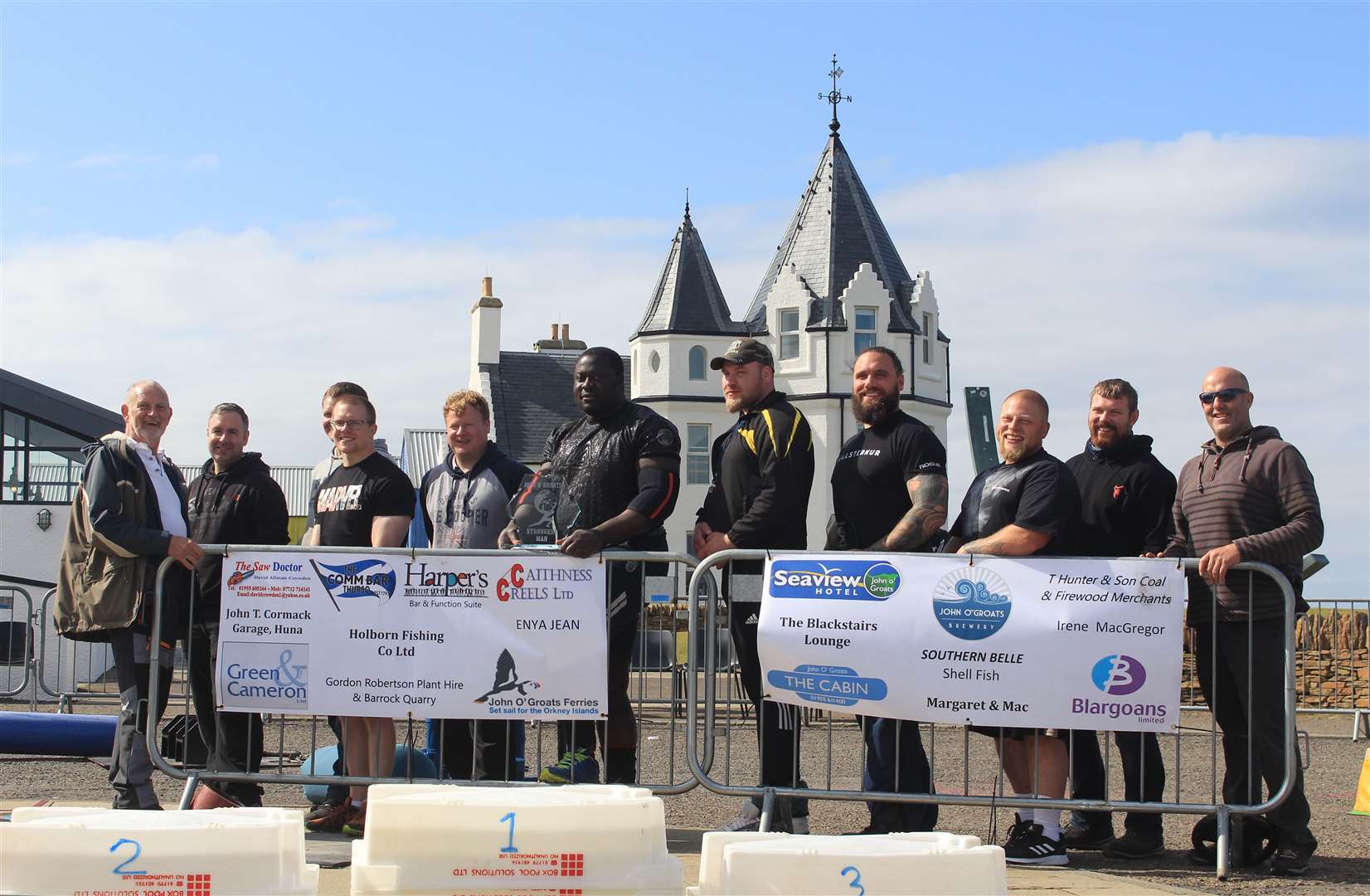 The 2021 John O'Groats Strongest Man contestants along with organiser Kevin Macgregor (centre) and his team of helpers. There were 20 sponsors for the event. Picture: Alan Hendry