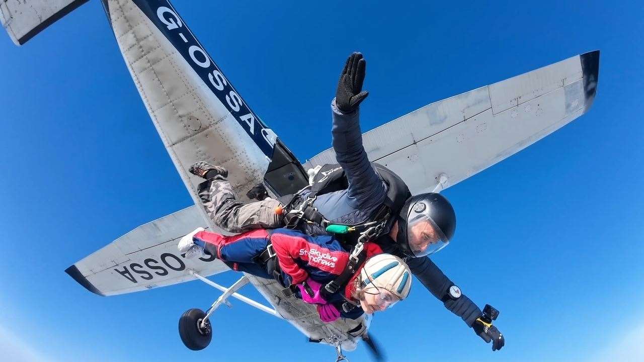 Aimee jumping out of a plane to raise money for eating disorder charity, Beat.