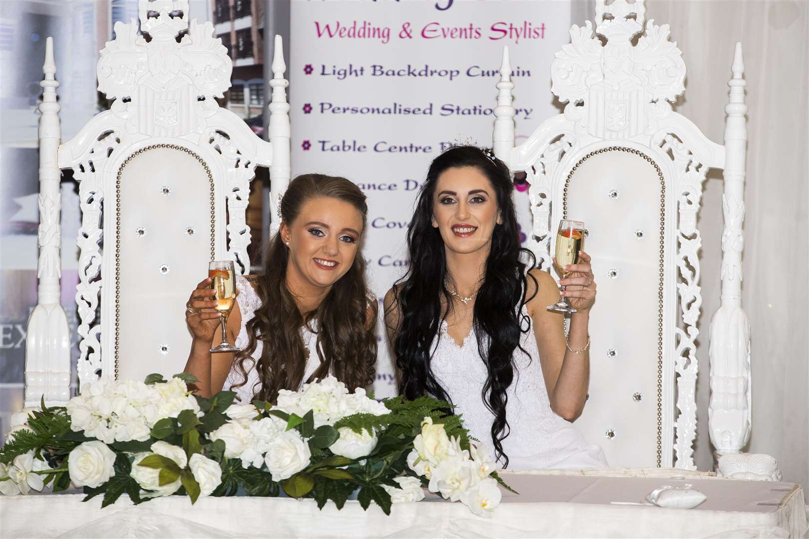 Robyn Peoples (left), 26, and Sharni Edwards, 27, at the Loughshore Hotel, in Carrickfergus, after they became the first couple to have a same-sex marriage in Northern Ireland on February 11 (Liam McBurney/PA)