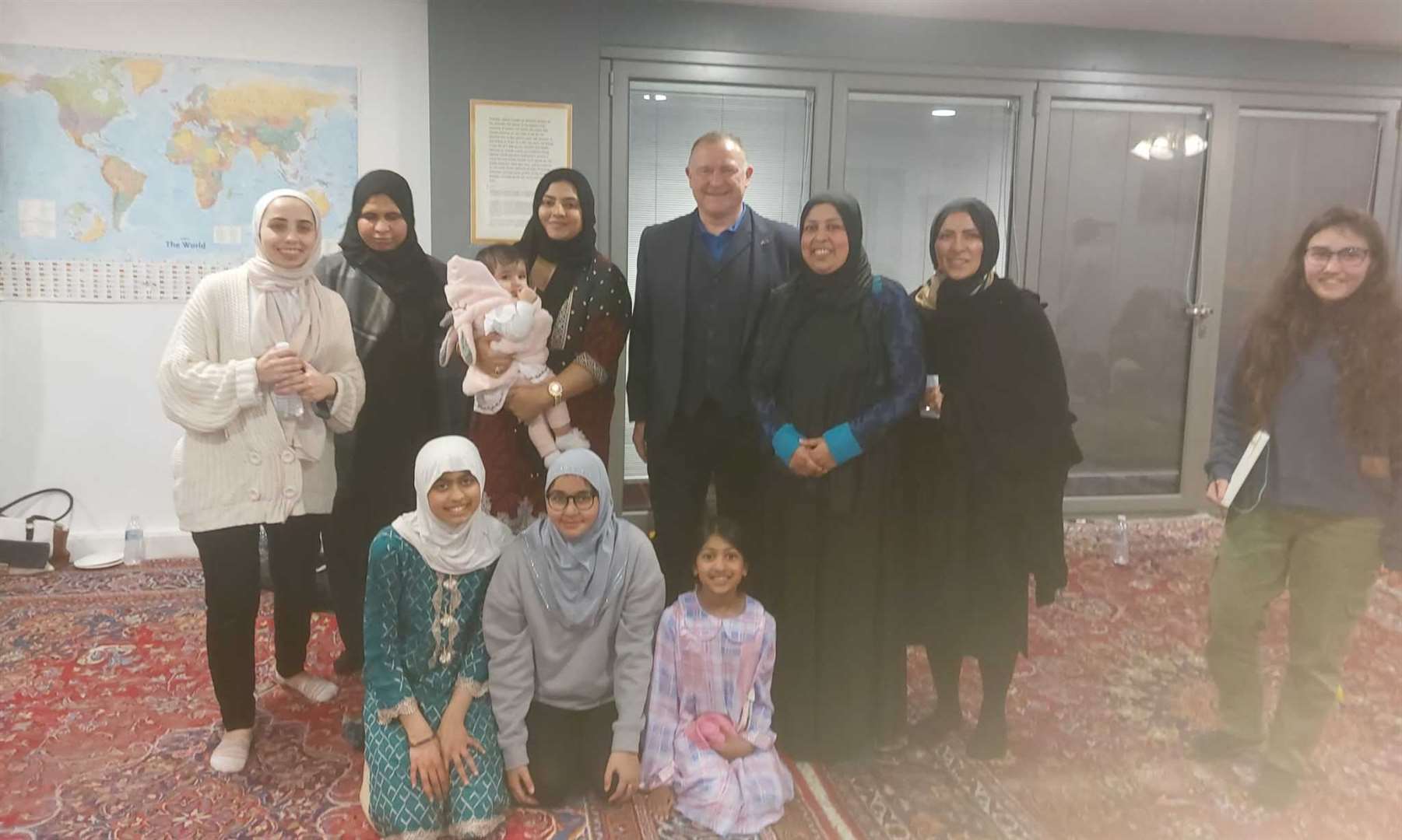 Haneen Basim abu-haikal (far left) and other women from the Masjid meet MP Drew Hendry.