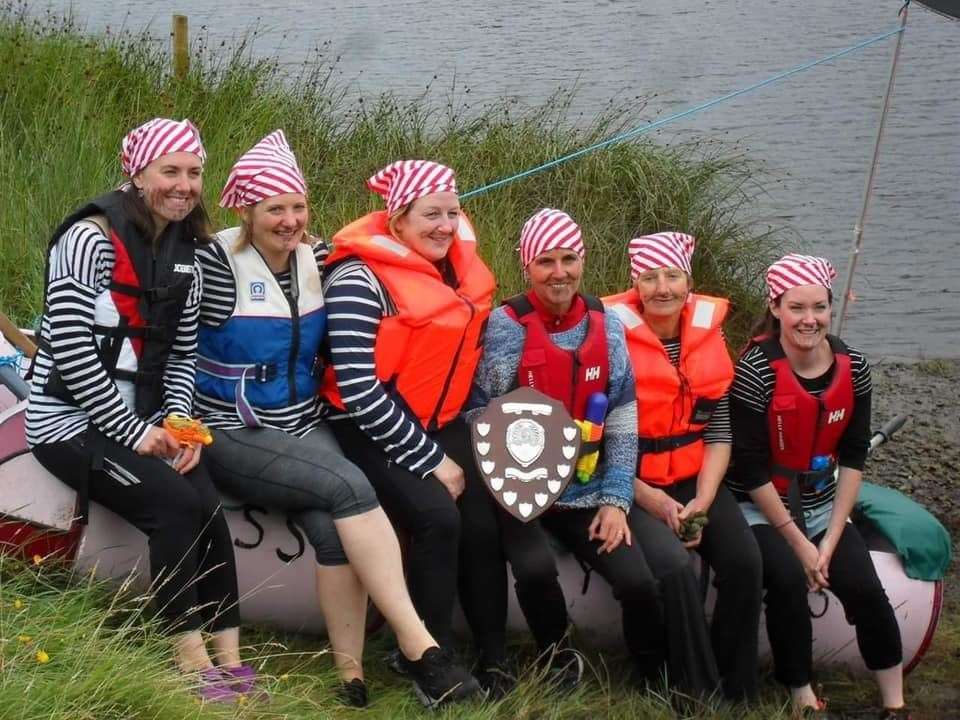 Winning raft race team, the Pretty Pollys.