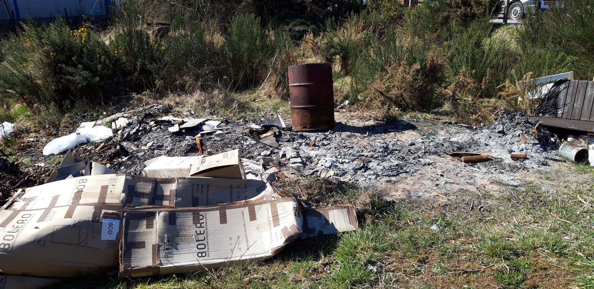 Fly-tippers are turning the overgrown site at Dornoch Retail Park into an eyesore.