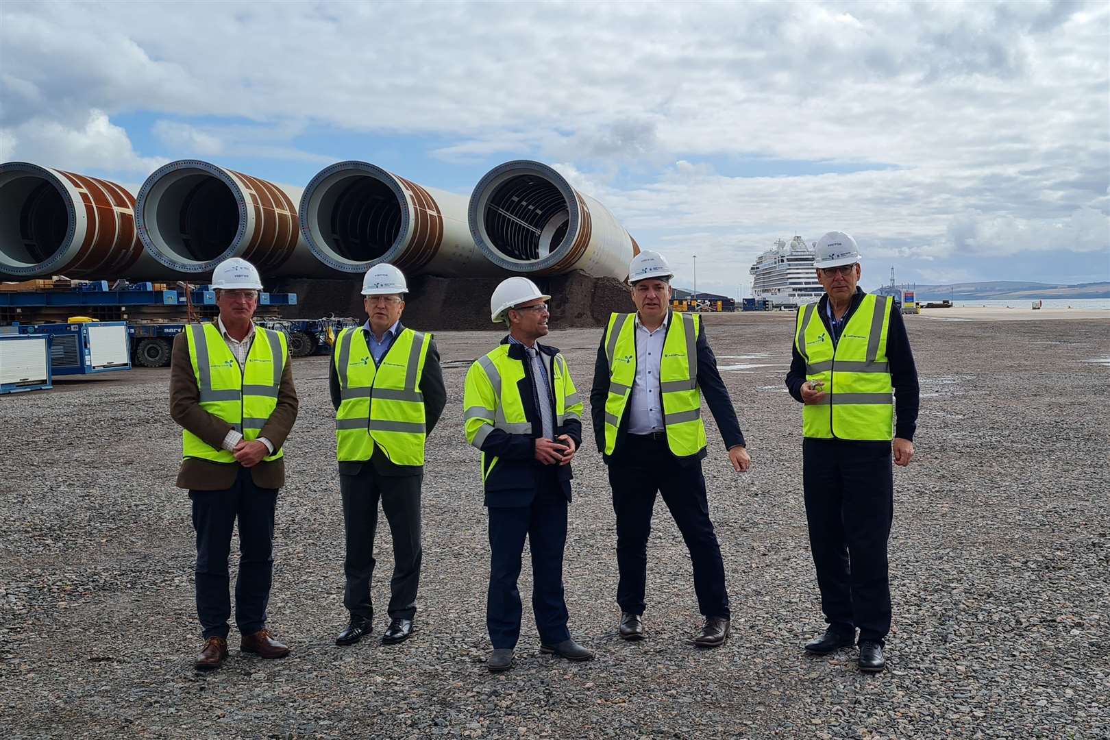 Richard Lochhead, second from right, with, left to right: PoCF Chair Hugh Mitchell; Scottish Government Green Freeports Programme Director Alistair McIntosh; Moray West Stakeholder Manager Roger McMichael and; PoCF Chief Executive Bob Buskie.