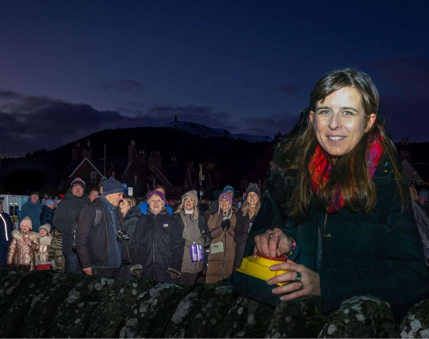 Elizabeth Costin, the daughter of the Earl of Sutherland, switched on the Golspie lights. A new light this year is in the shape of a surf board, in tribute to Mrs Costin’s brother, the late Alexander Sutherland, Lord Strathnaver. Pictures: Alan Butcher