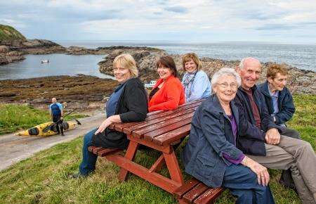 Residents join cllr Linda Munro (second left) and SSE’s Fiona Morrison (third left) at the slipway. From left, Suzanne Mackay, Joan Ritchie, William Macdonald and Rena Macleod.