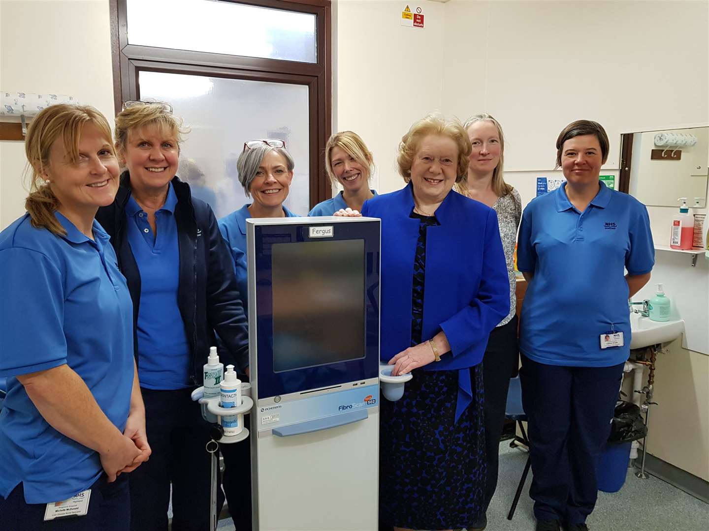 Christina Cameron (third right) with the new scanner and NHS Highland staff including Dr Andrea Broad (second right).