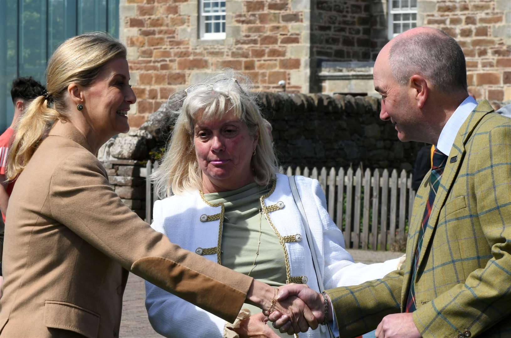 Sophie meets Vice Lord-Lieutenant Kim Tulloch and Neil Hampton, general manager of Royal Dornoch Golf Club. Picture: James MacKenzie