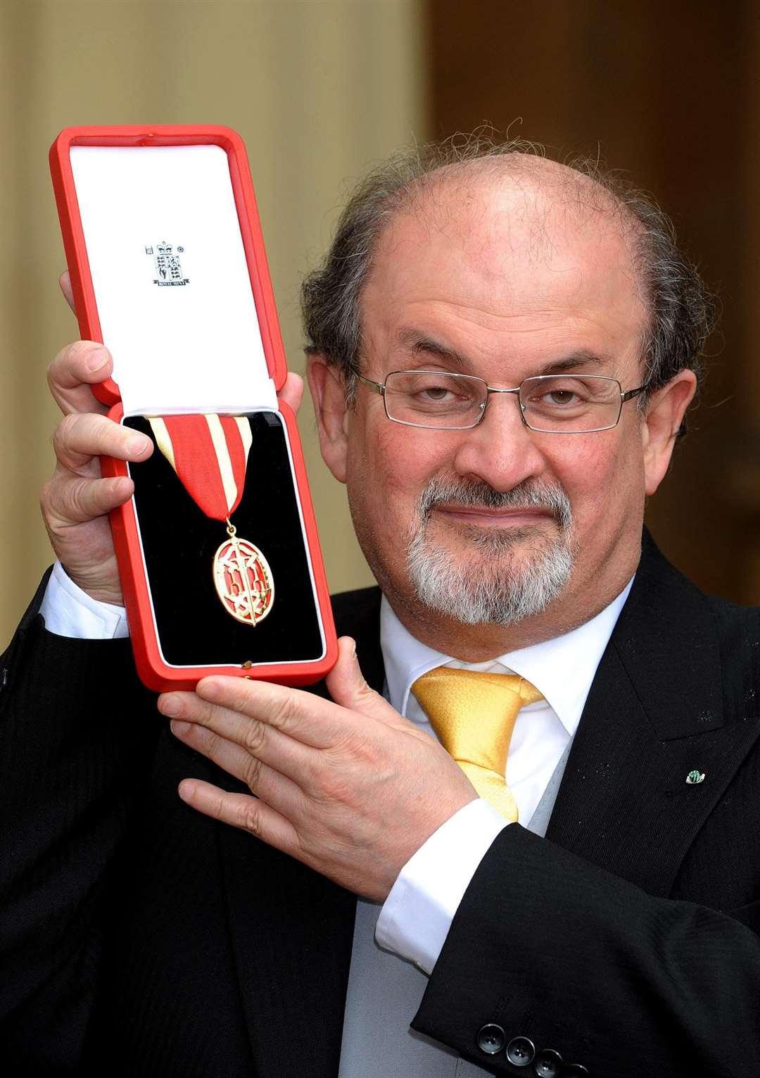 Sir Salman Rushdie after receiving his knighthood from the Queen in 2008 (John Stillwell/PA)