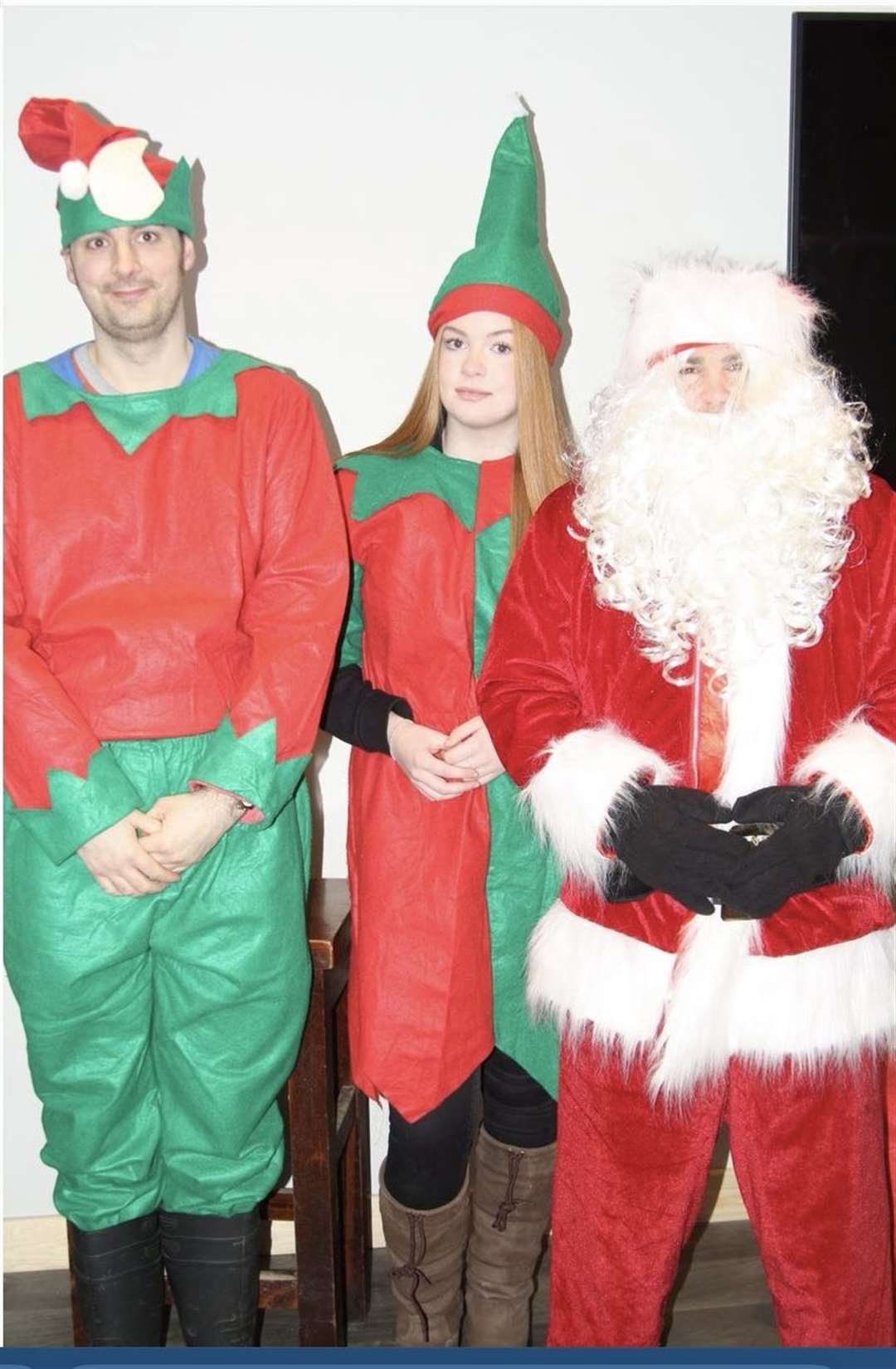 Santa with elves Ewan Bruce and Lucy Mackenzie.