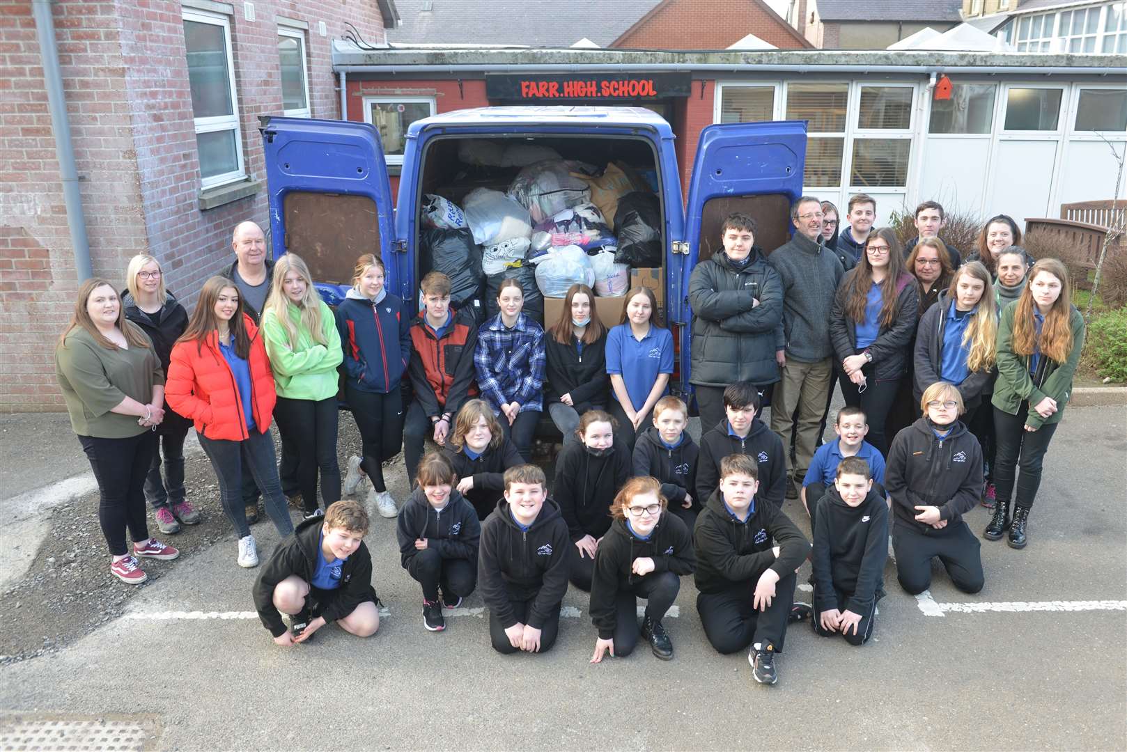 The donations were taken to Farr High School where they were sorted by pupil volunteers and loaded onto a van. Picture: Jim A Johnston