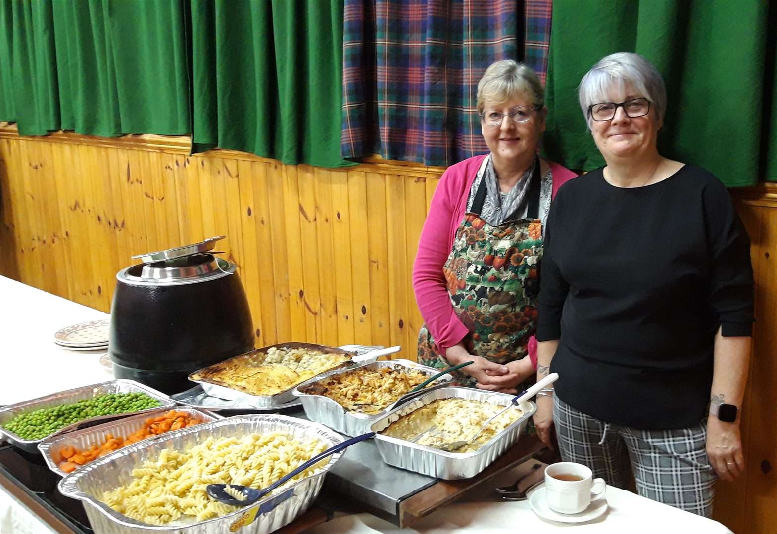 Tracy Campbell (right) and Penny Duncan at the serving station.