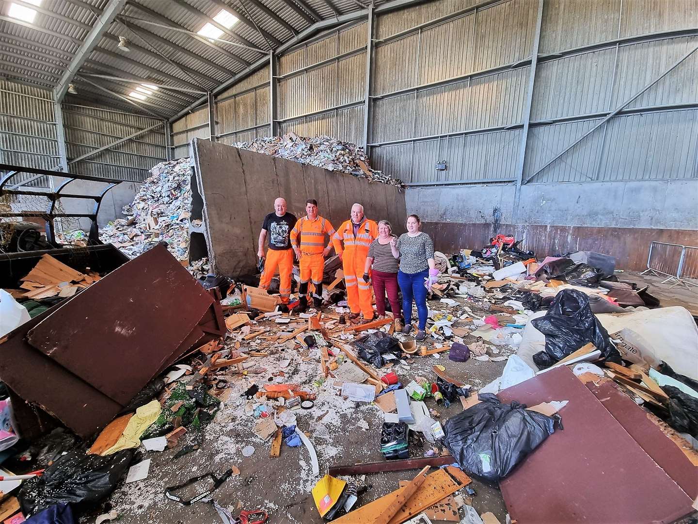Looking at the tons of compacted waste at the site, Brian said it was like looking for a needle in a haystack to find the lost pendant with his mum's ashes.