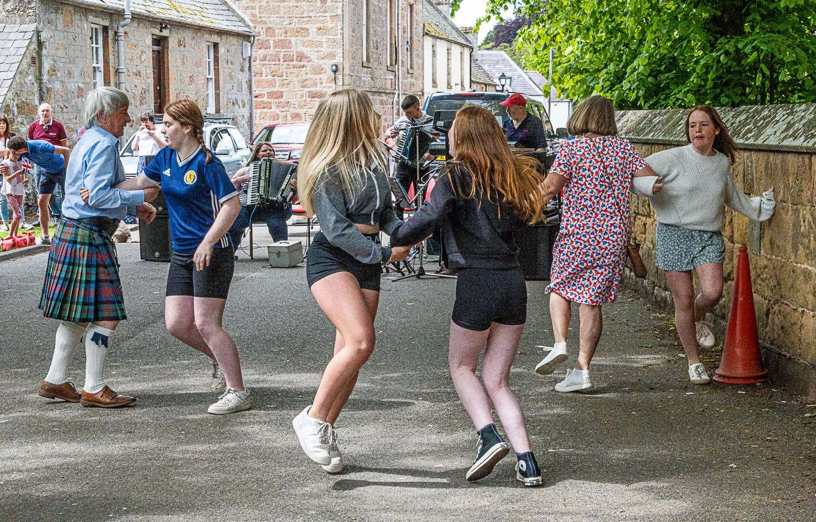 Dancing in the street to the Dornoch Ceilidh Band. Picture: Andy Kirby