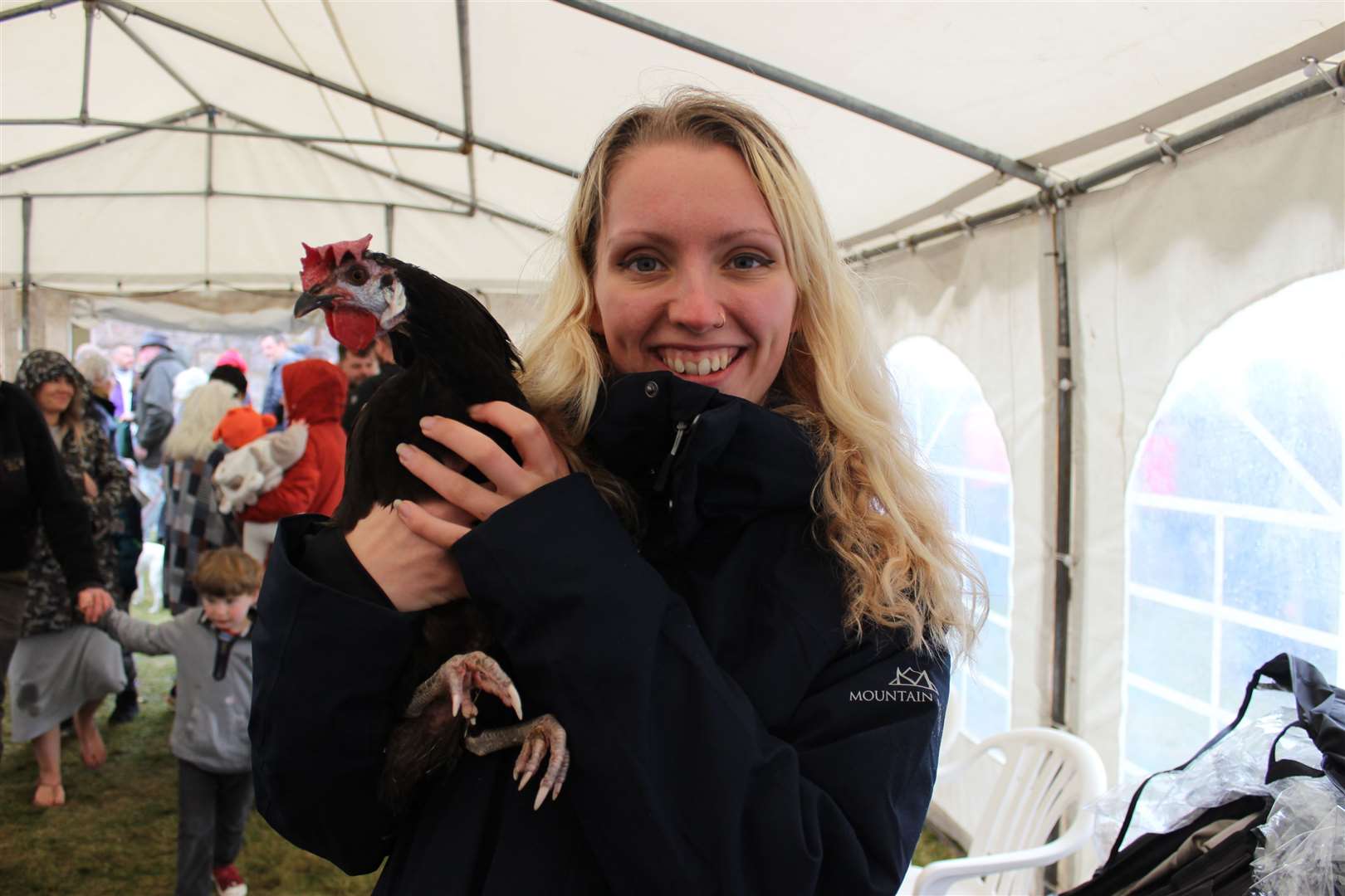 Abbie Nelson from Lochinver with her feisty hen called Spanish who started a fight during the chicken race.