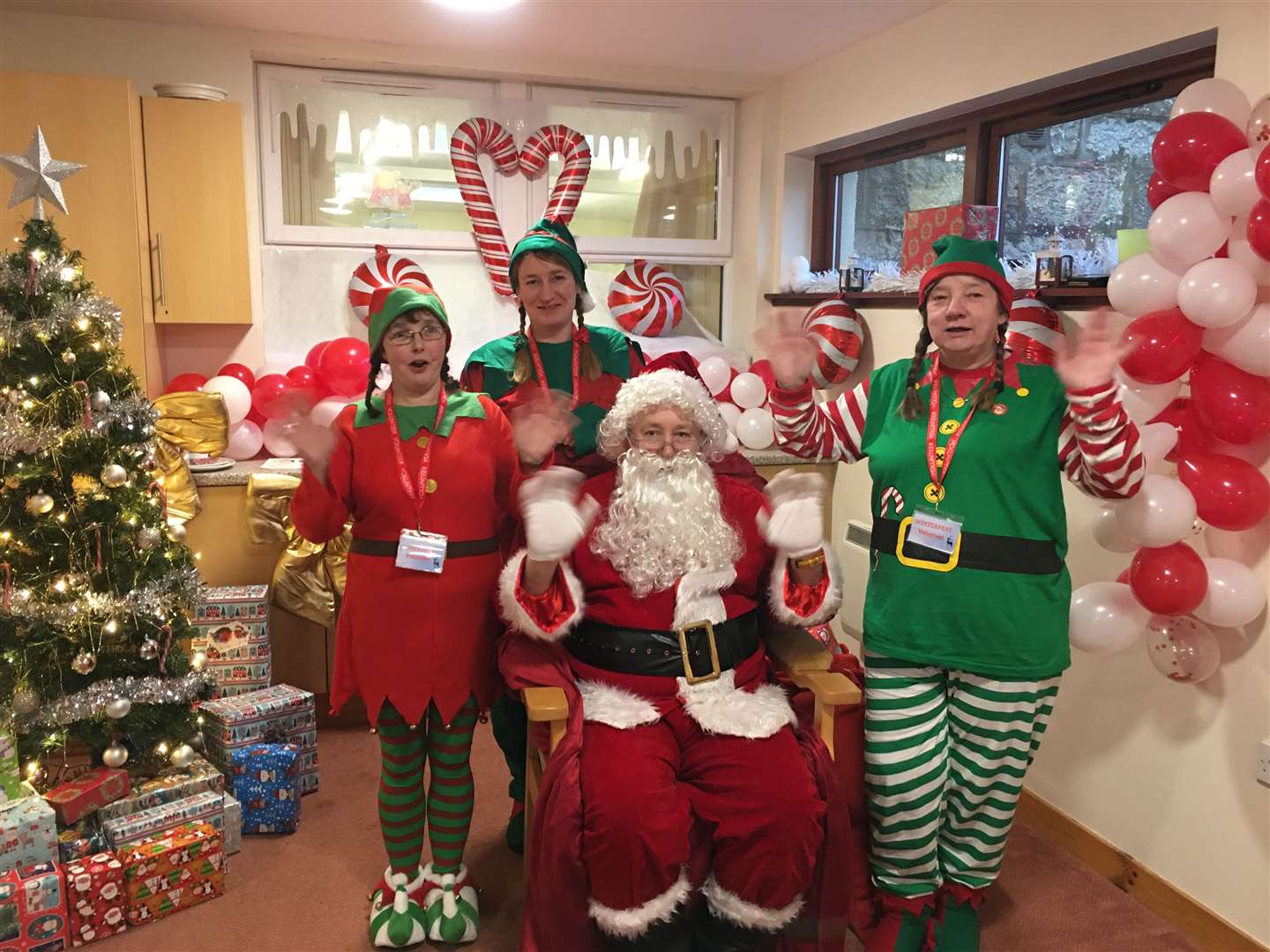Santa was helped by a team of three elves.
