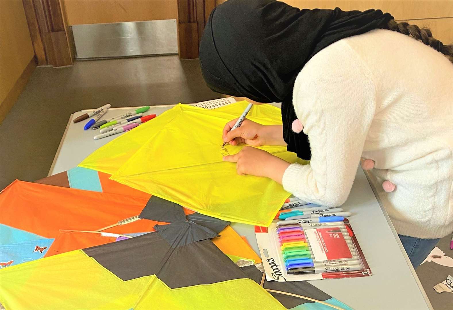 Kite-making allowed Afghan to share their traditions as well as giving them a chance to practice their English language skills.