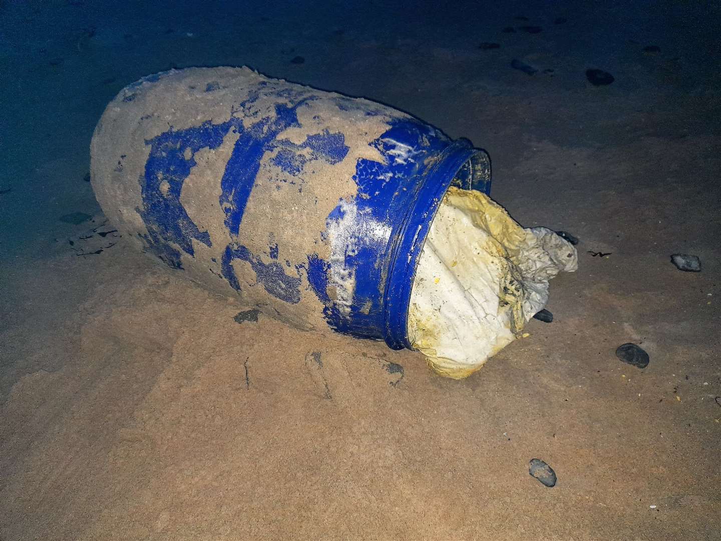 The barrel with its contents exposed at Dunnet beach on Wednesday.