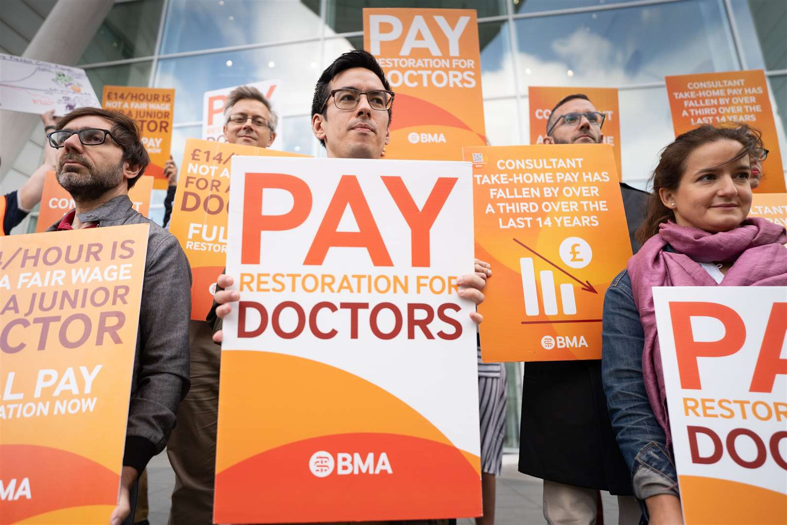 Junior doctors and consultants on the picket line outside University College Hospital, London (Stefan Rousseau/PA)